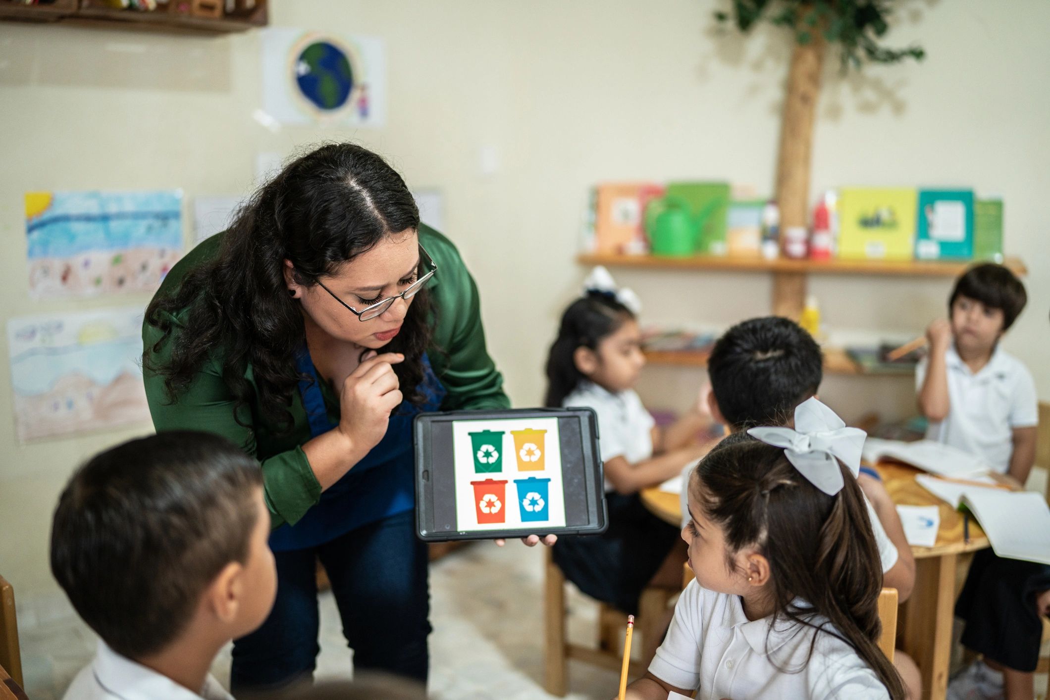 Teacher reading and talking with children during circle time
